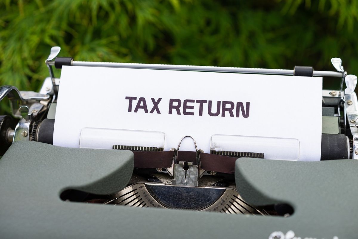 Typewriter with a page that reads Tax Return